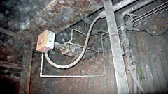 The TDLS detect unit in a fly ash-filled environment. It is noticeably covered with ash.